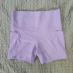 Athleta Salutation Stash Pocket II 5" short purple medium